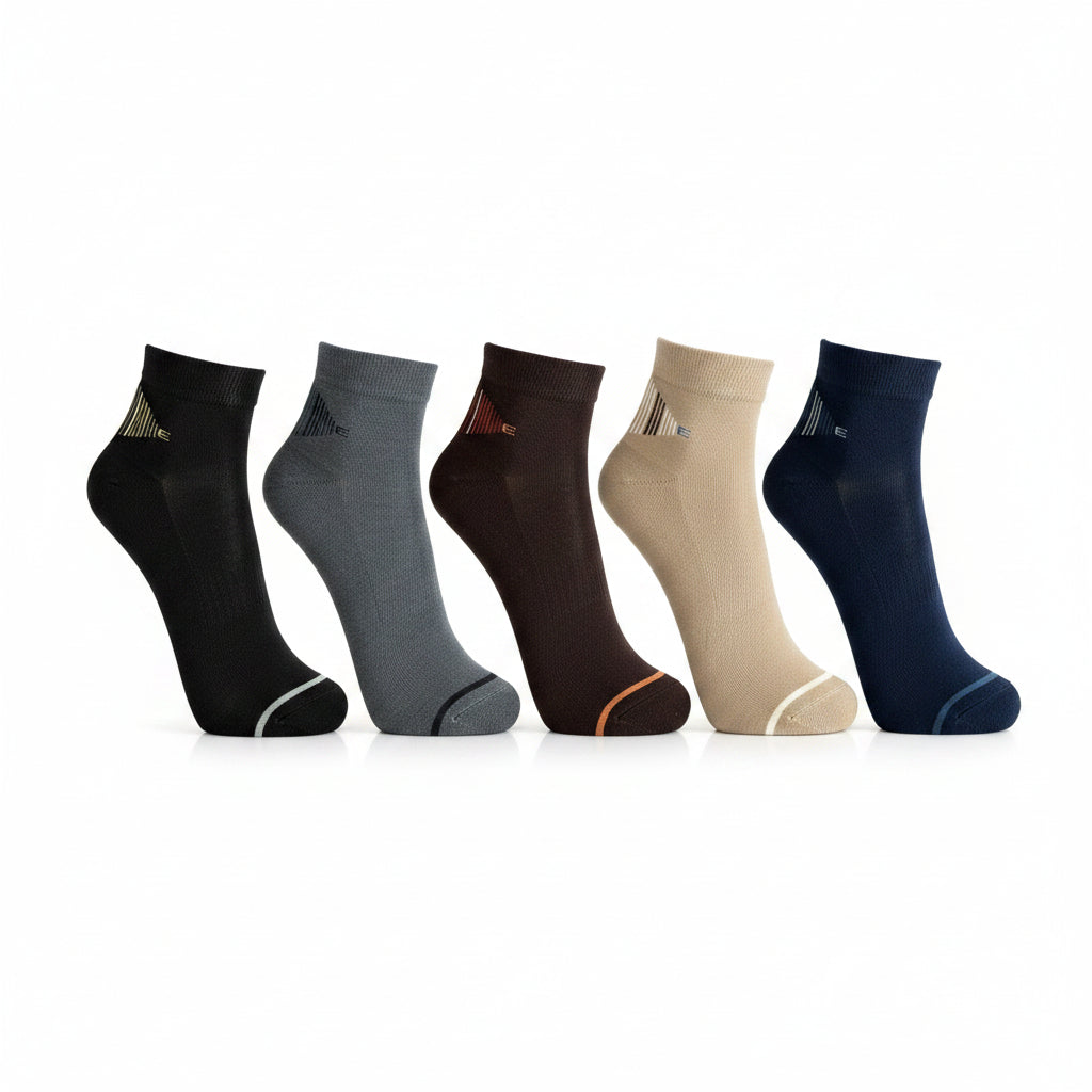 Rodimachine set of five ankle socks in black, grey, brown, beige, and navy with minimalist geometric cuff patterns.