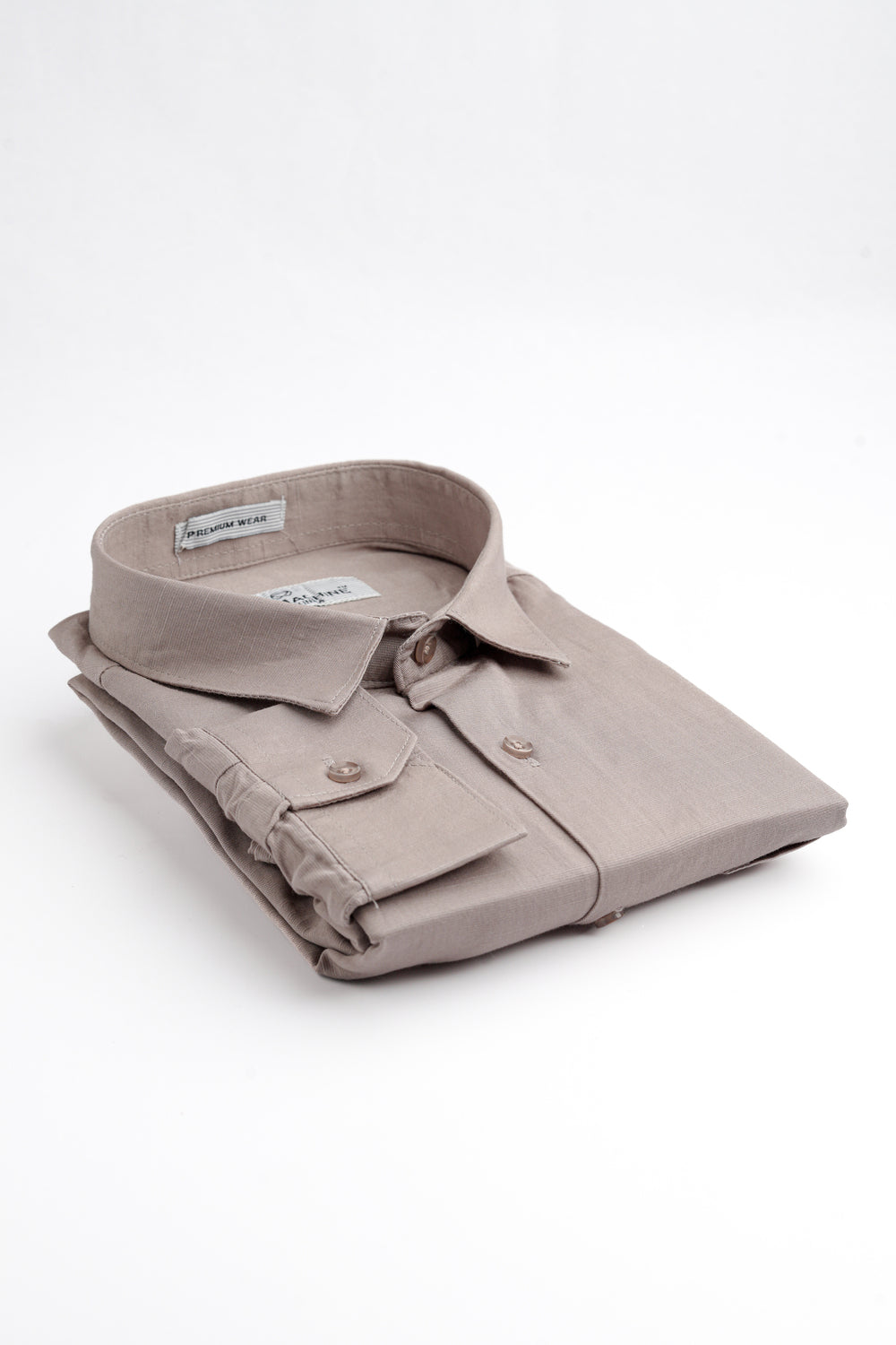 Folded dark grey rodi machine shirt with a brand label on a white background