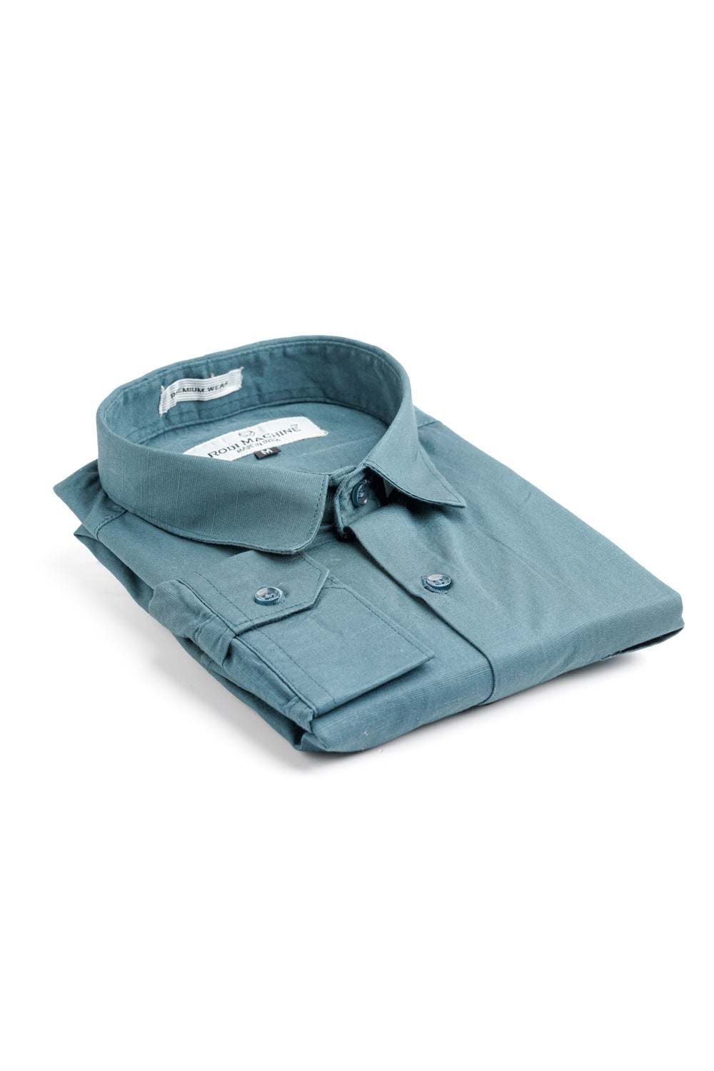 Folded Peacock colour Rodi Machine shirt on a white background